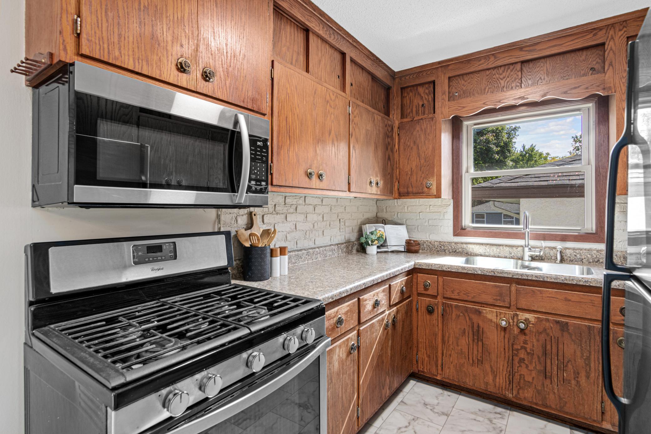 Warm cabinetry adds character in the kitchen.