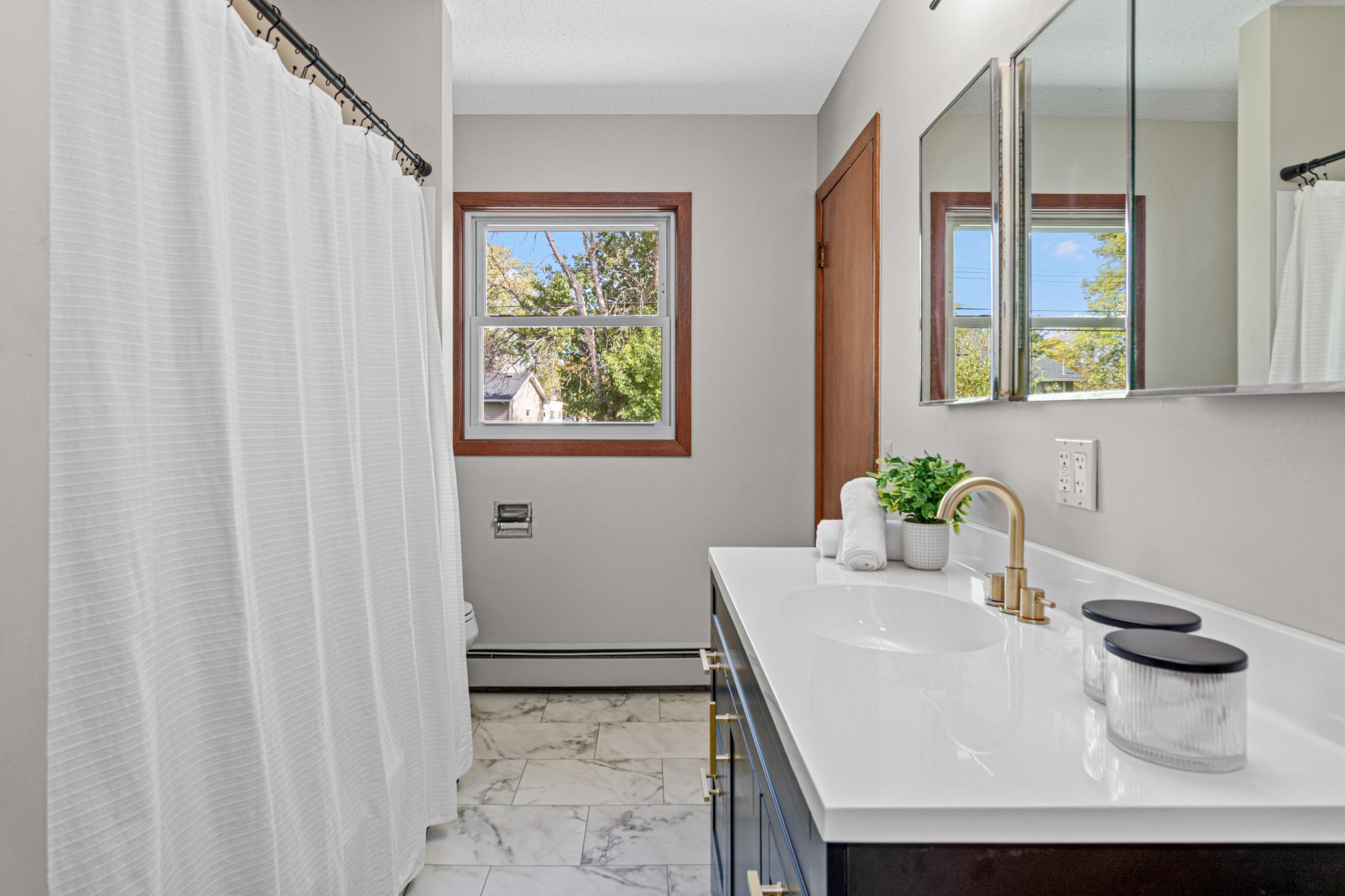 A refreshed full bath with thoughtful updates.