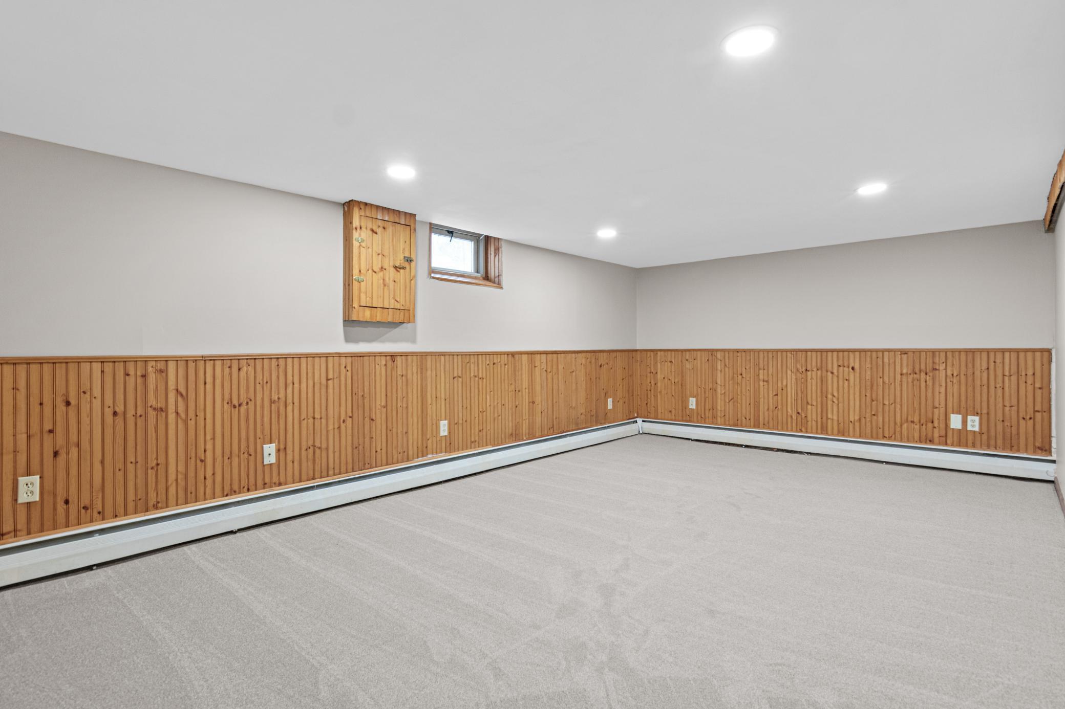 Flexible space for gathering, hobbies or movie nights.