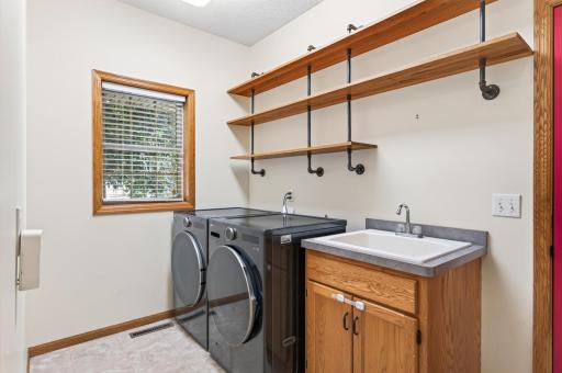 Main Level Laundry Room with New Washer and Dryer
