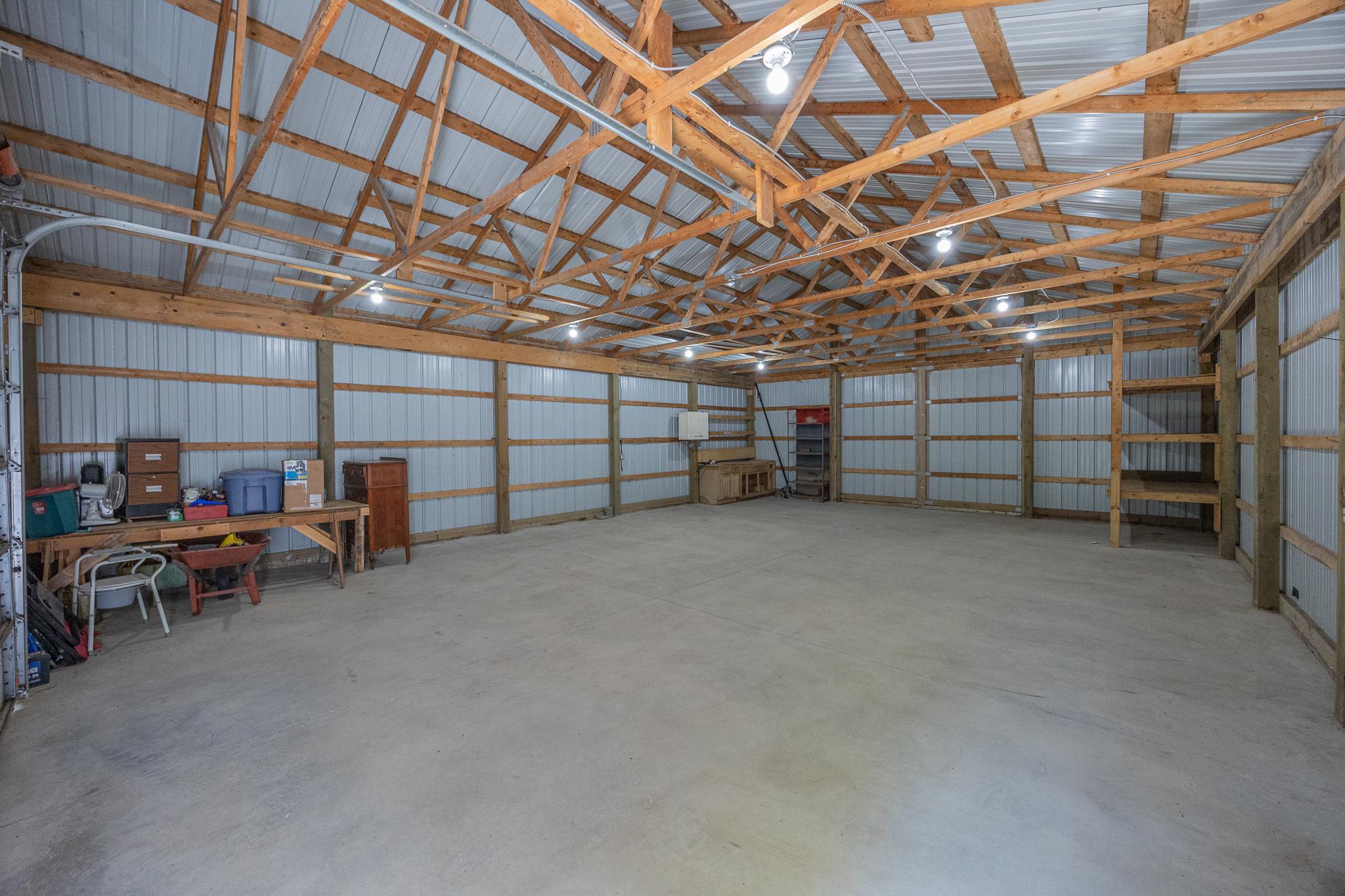 Interior of pole barn with power and cement floor