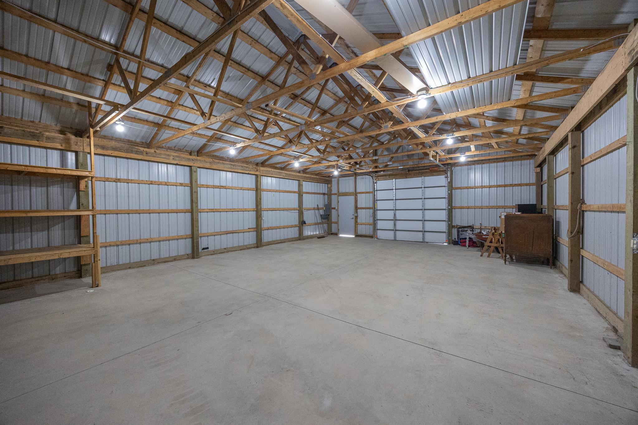 Interior of pole barn with electric and cement floor
