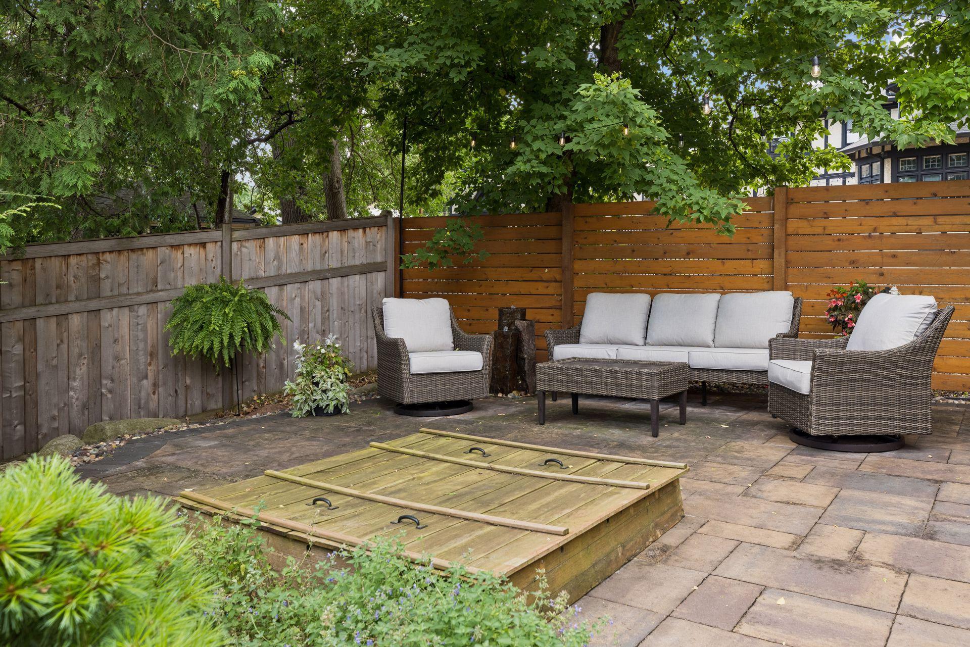 Multiple patio sitting areas perfect for entertaining or relaxing