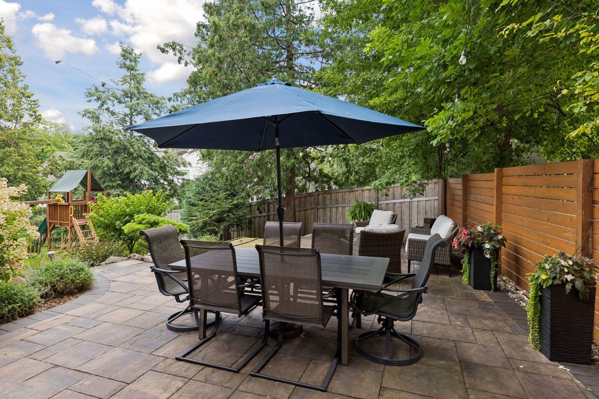Expanded backyard patio perfect for entertaining or relaxing
