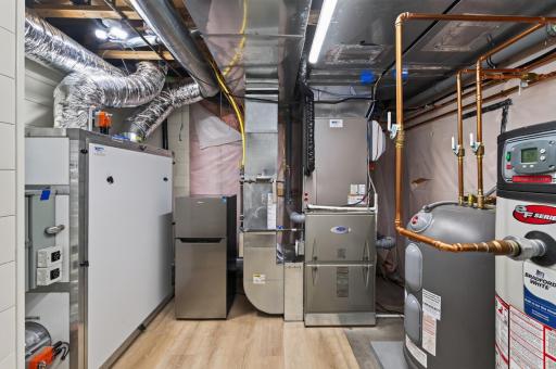 Major improvements include a commercial-grade high-efficiency furnace and air conditioner (2024), new air handler, and a new extra-large, resort-style, commercial water heater designed for continuous use - delivering the comfort of reliable hot water