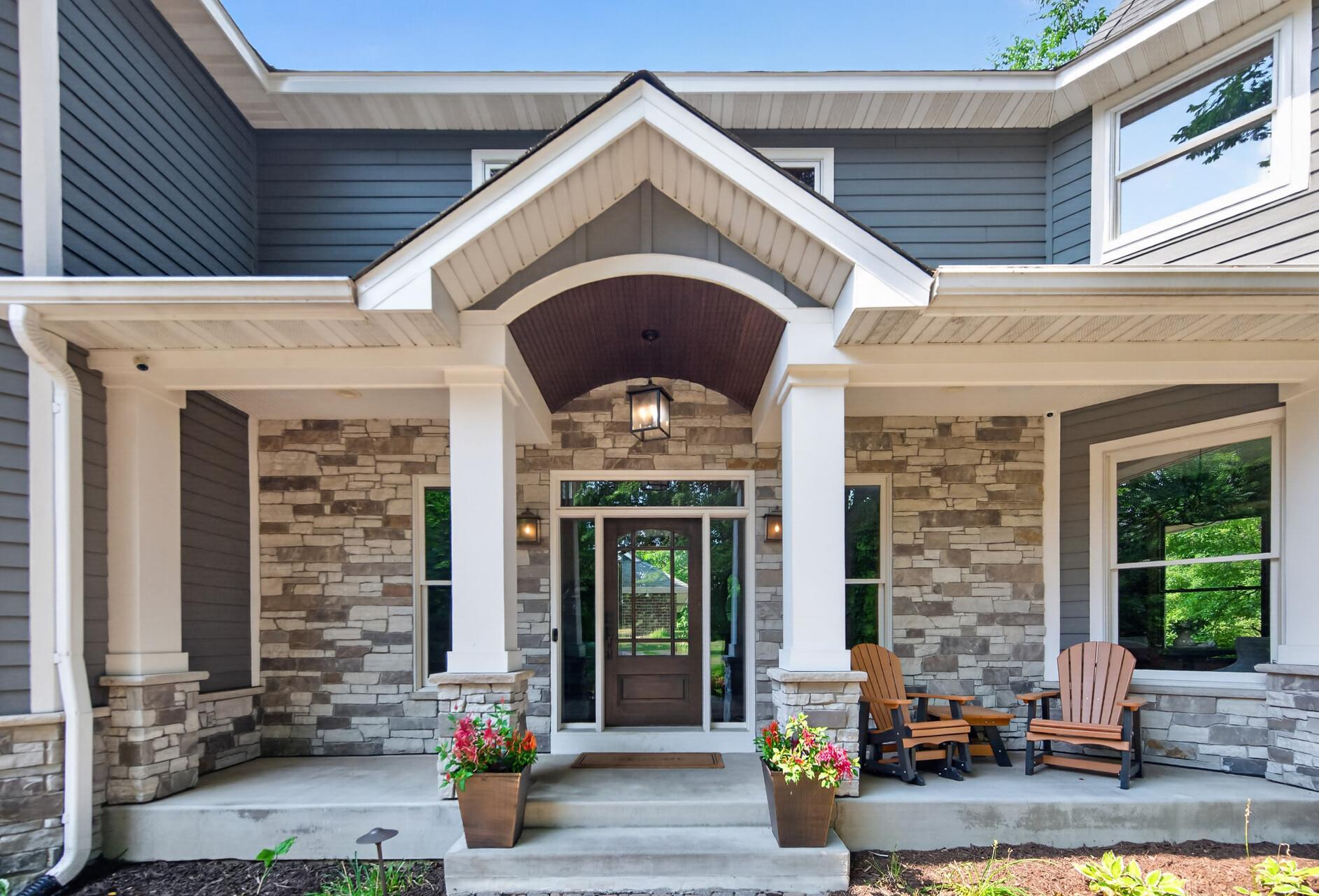 The inviting south-facing front porch is the perfect spot to enjoy your morning coffee while watching the sunrise