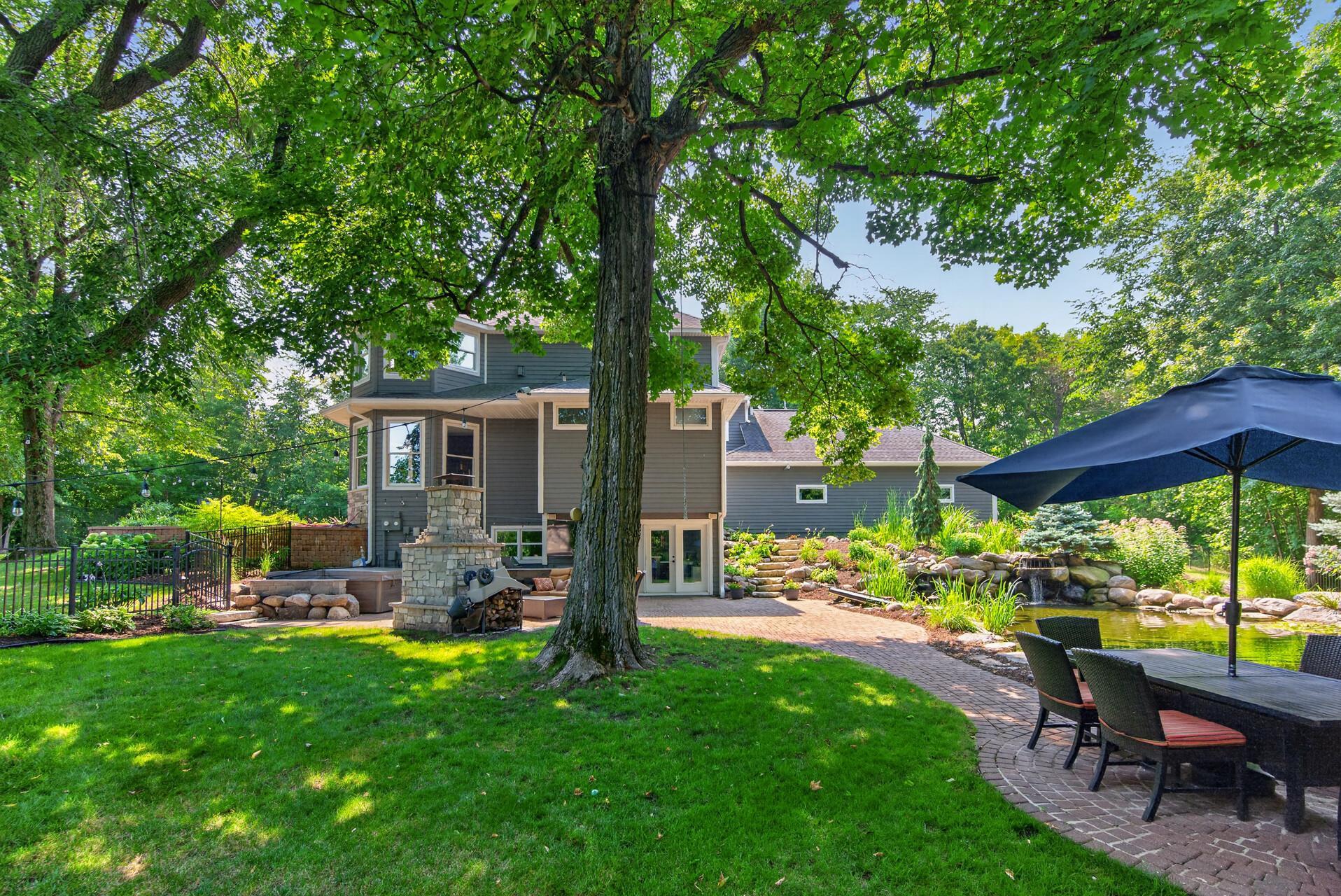 Let the animals run wild with the enclosed fence around backyard pond area