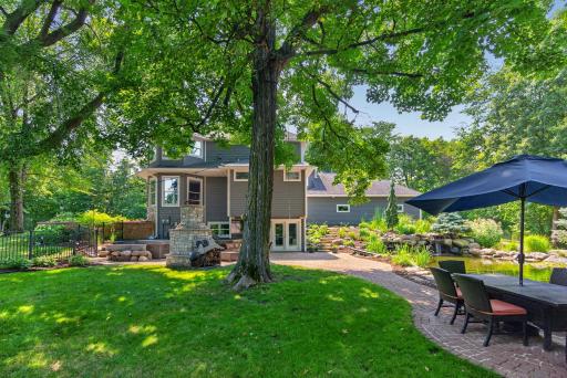 Let the animals run wild with the enclosed fence around backyard pond area