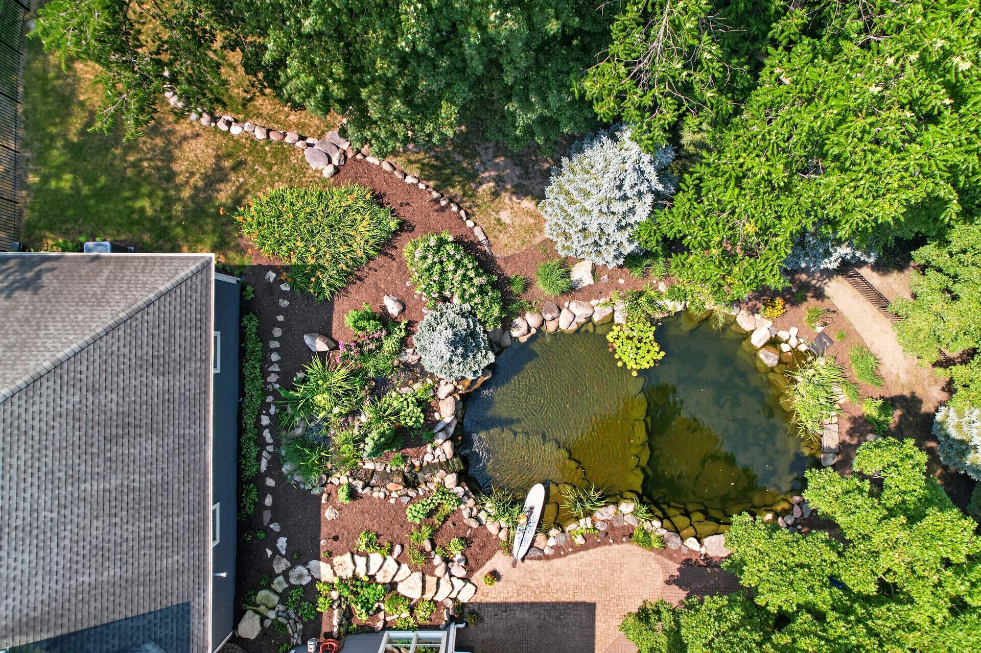 Surrounded by mature trees, this private backyard offers a peaceful, resort-like setting with a quiet, relaxing atmosphere you'll enjoy year-round