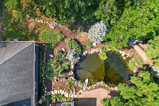 Surrounded by mature trees, this private backyard offers a peaceful, resort-like setting with a quiet, relaxing atmosphere you'll enjoy year-round