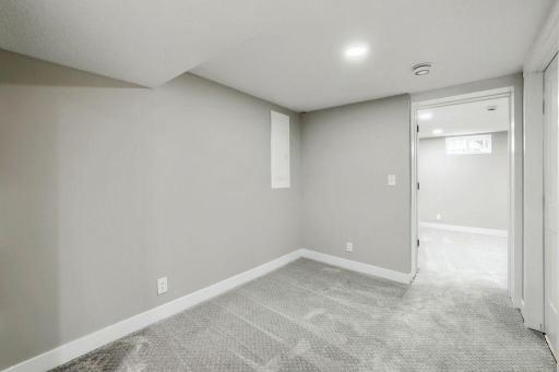 Lower Level Hallway to Bedroom and Laundry