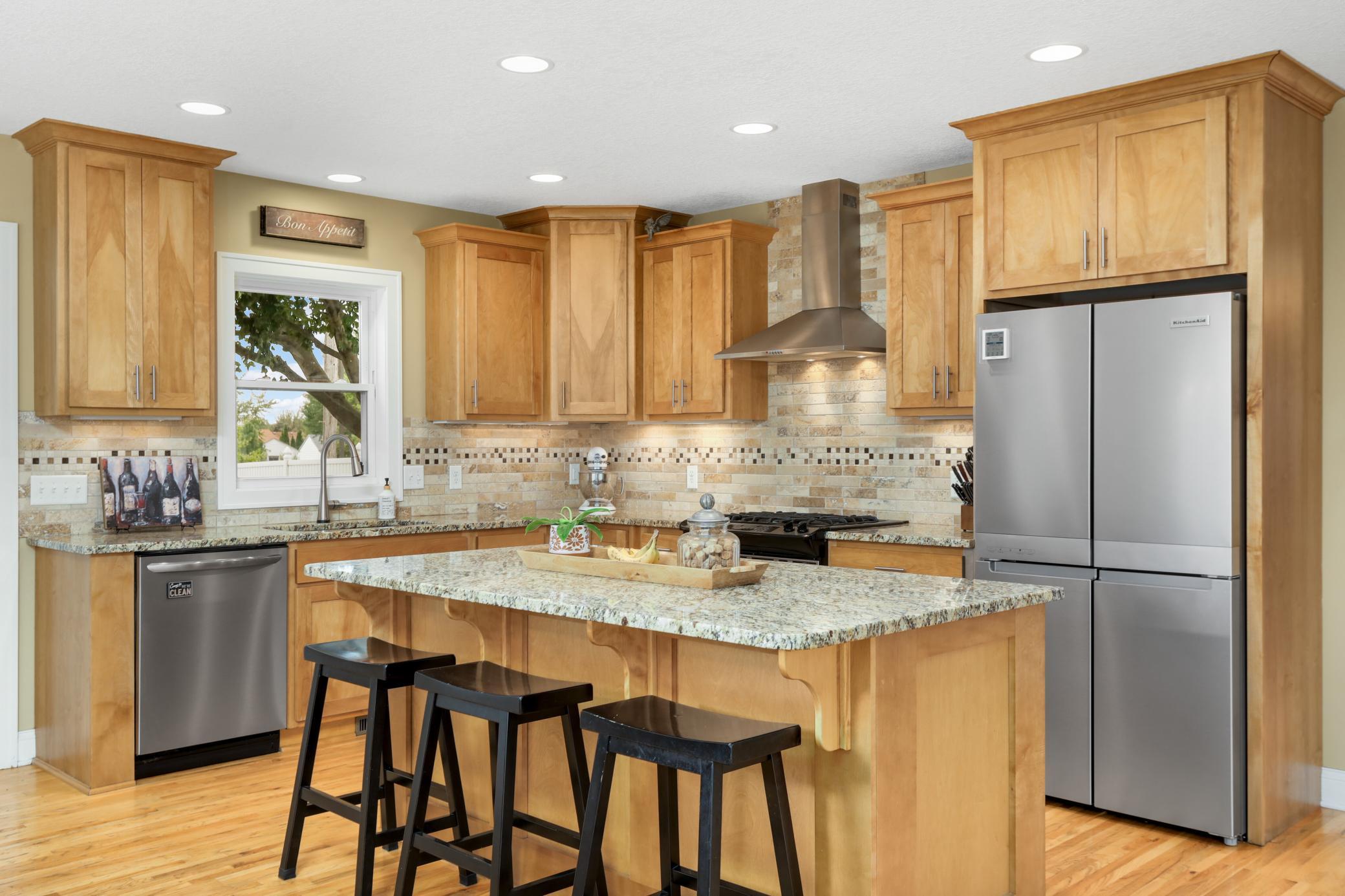 The kitchen island is the heart of the main floor.