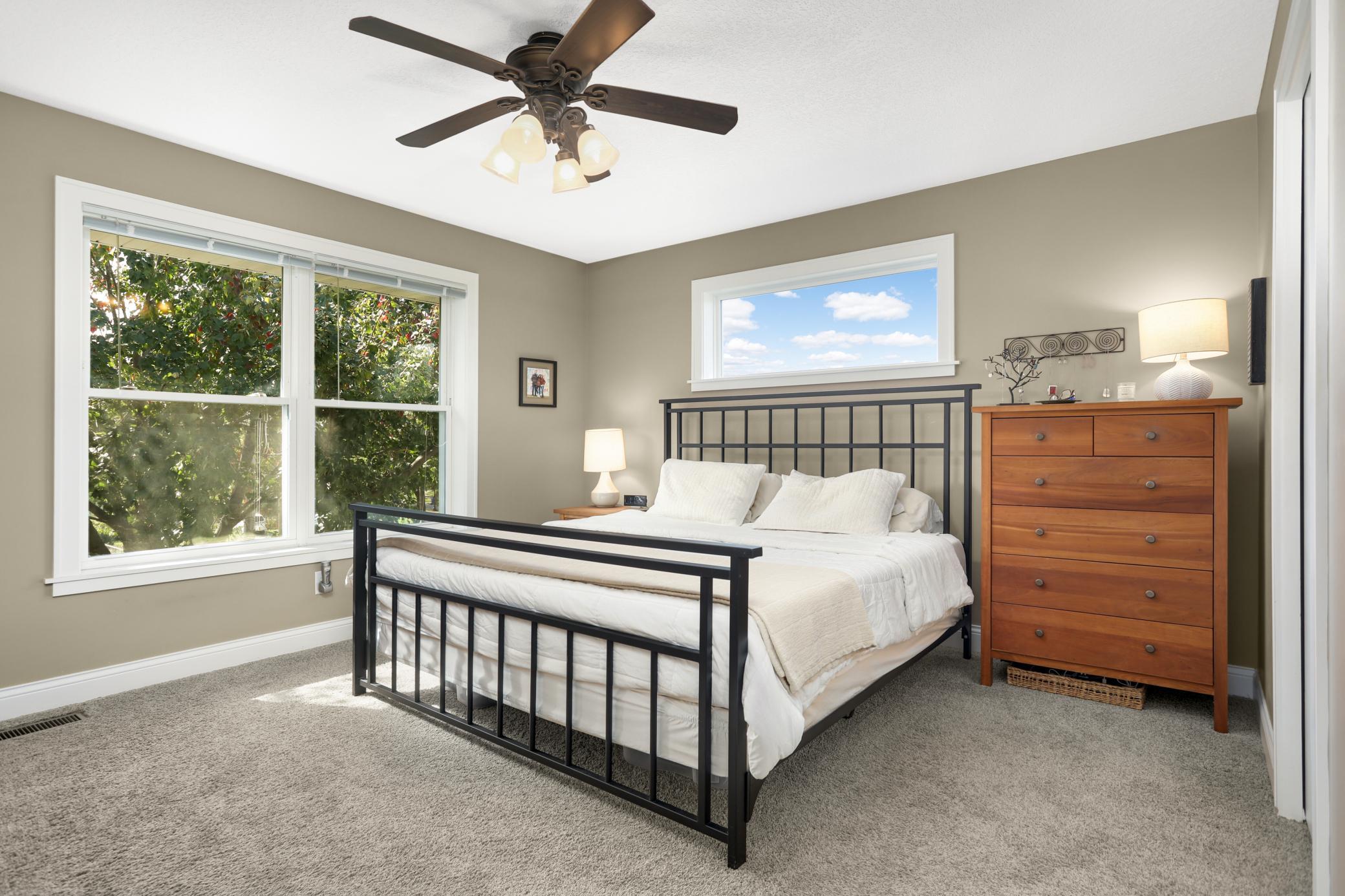 The large primary suite with private attached bathroom.