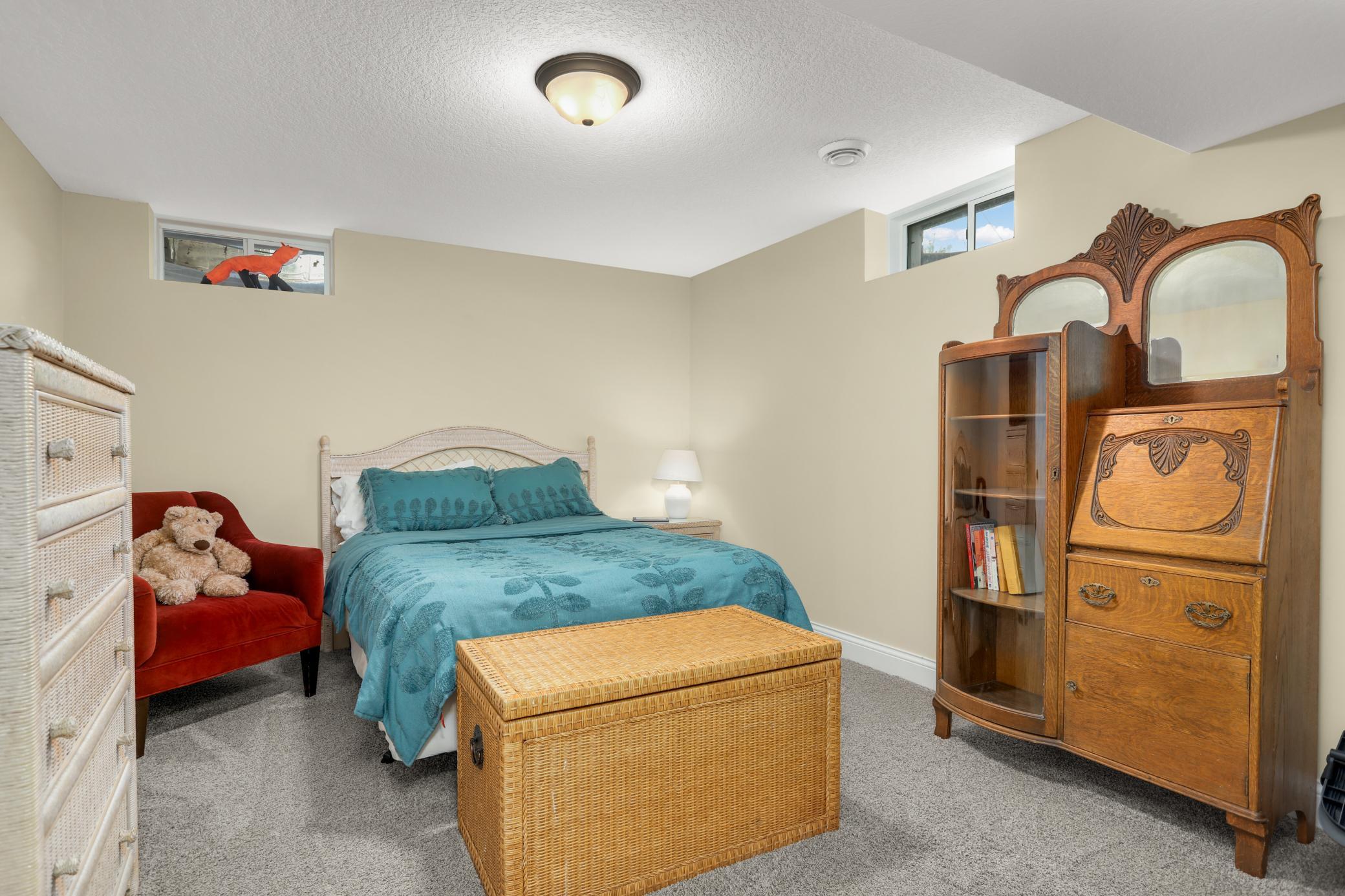 The lower level has a bonus room that could easily become a fifth bedroom with the addition of an egress window.
