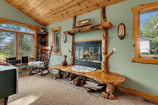 Unique up-north inspired wood fireplace