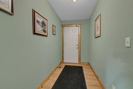 Door leading to the large 4 car garage