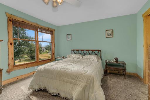 Rustic trim adorns the windows