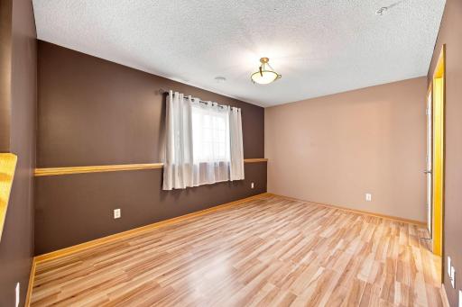 Lower level family room or office as you enter home from garage.