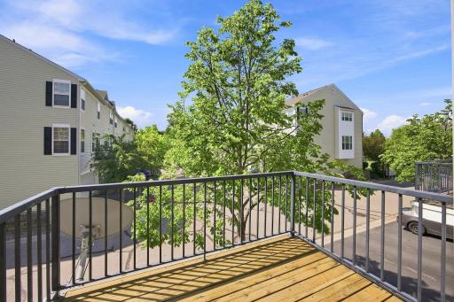 Deck off the kitchen is a great place to enjoy your morning coffee.