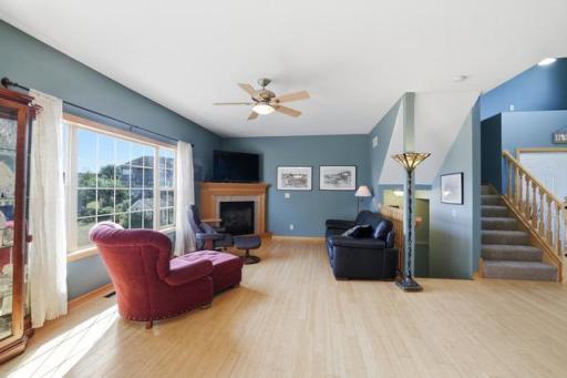 Light & bright living room with gas fireplace