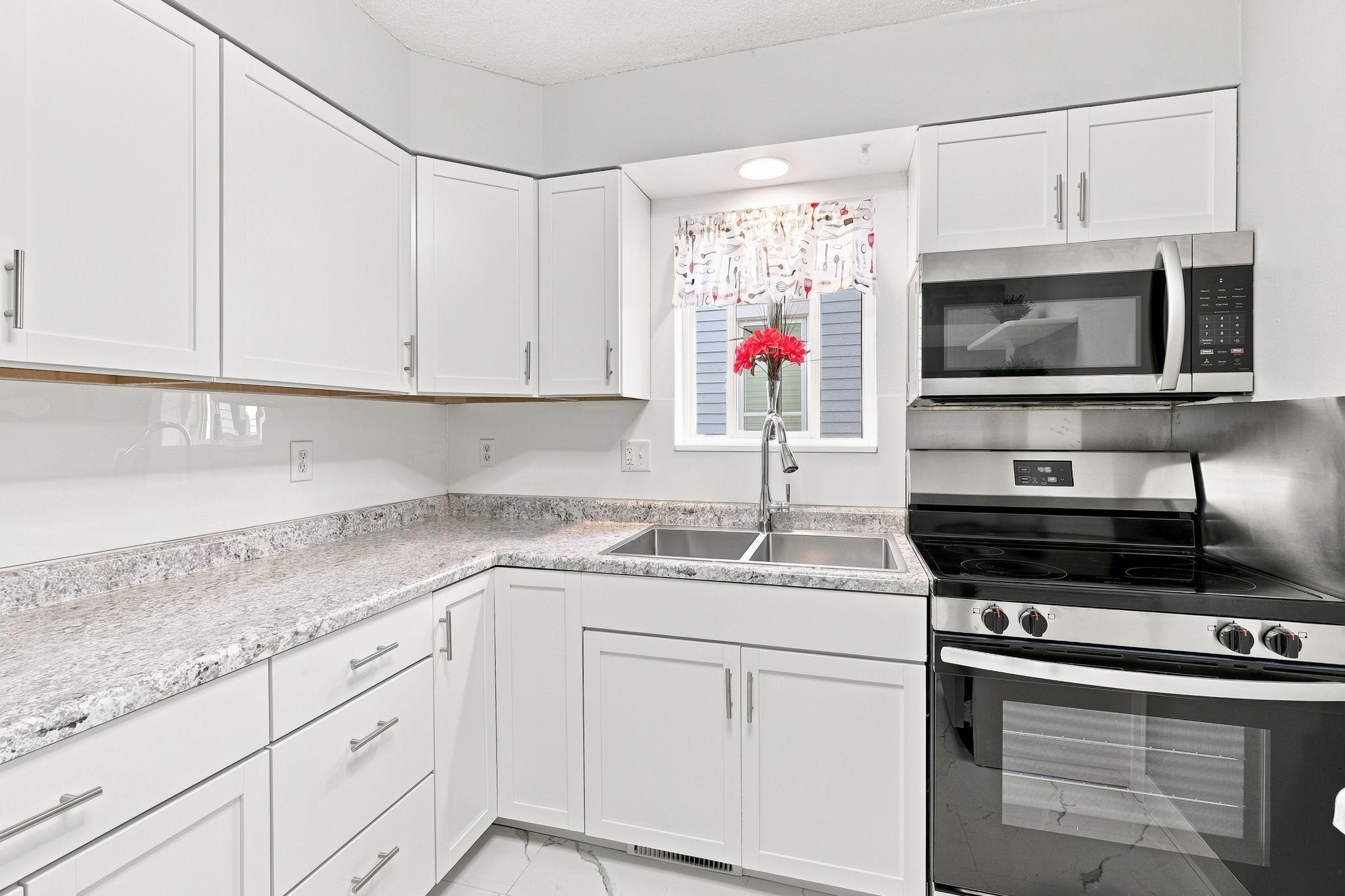 New counters, cabinets, sink, lighting, etc