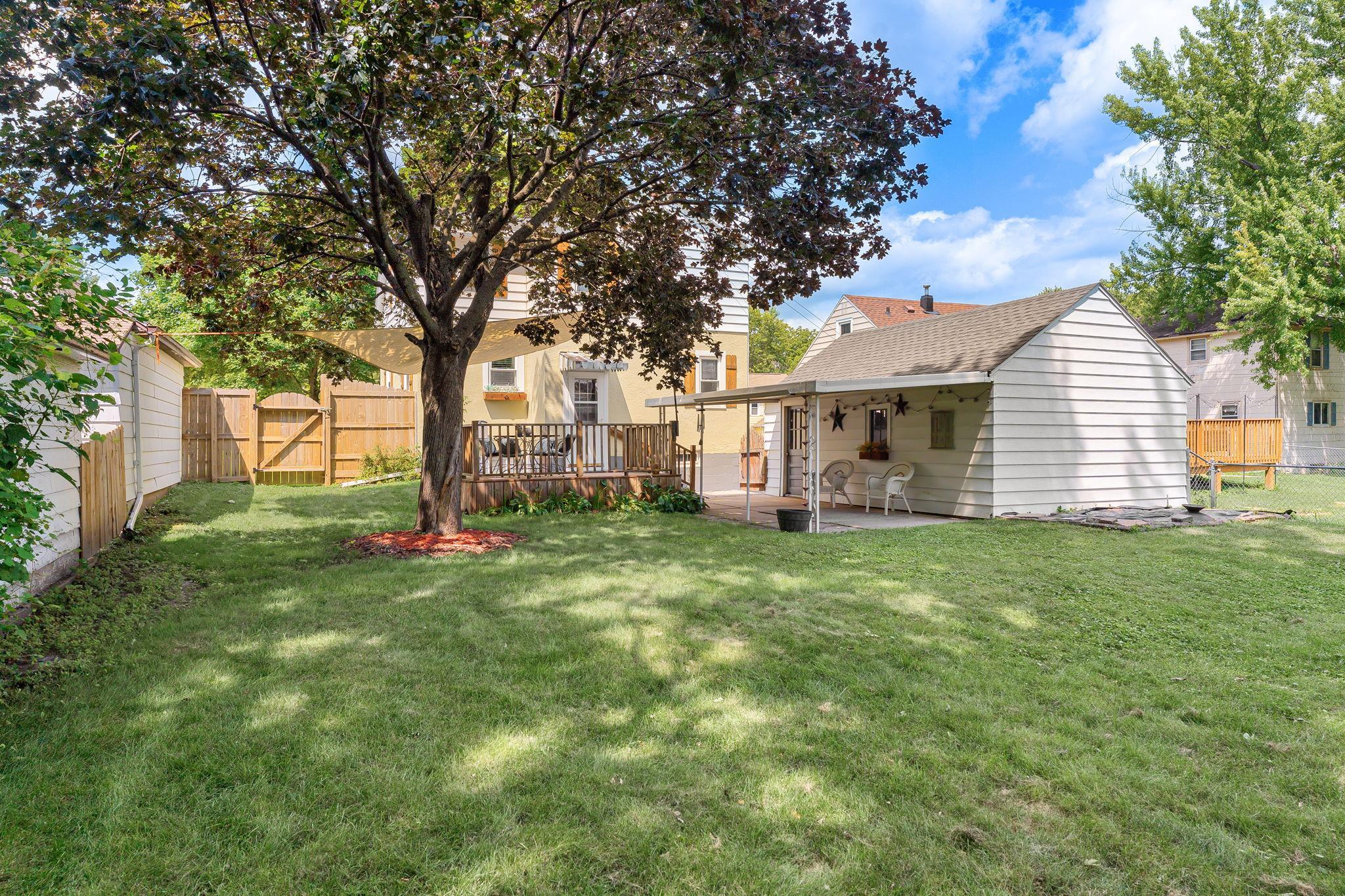 Fenced Back Yard with Deck and Covered Patio