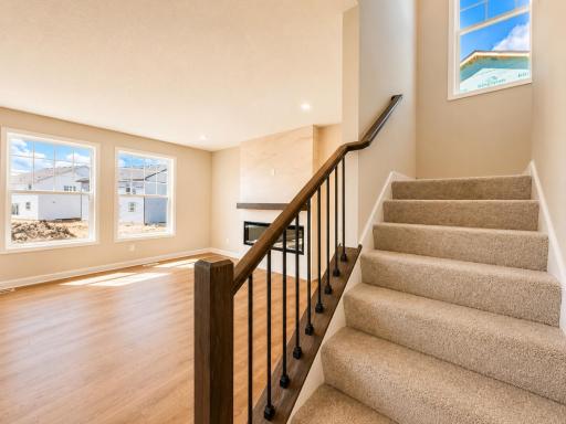 (Photo is of the actual home.) The open floorplan allows for seamless flow throughout the home