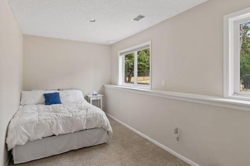 4th bedroom in the lower level with daylight windows.