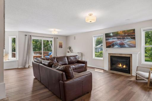 Living room on the main floor with gas burning fireplace!