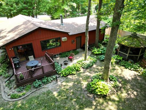 What a beautiful private backyard with so many spaces to draw you in.