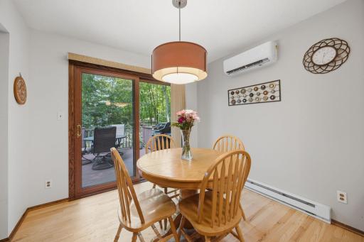 Dining area that walks out to the deck and grill! Note: this dining area can have a larger table with more chairs for seating.