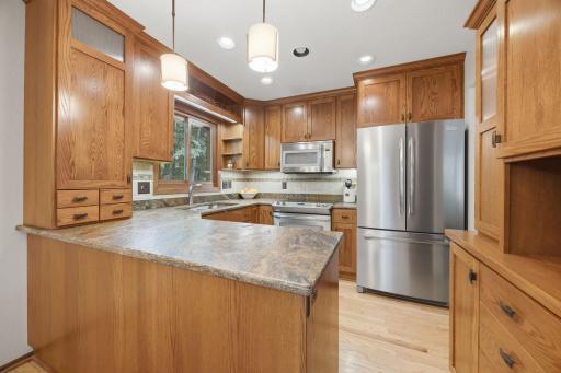 Beautifully updated kitchen in the past several years that has tons of different cupboard / storage space.