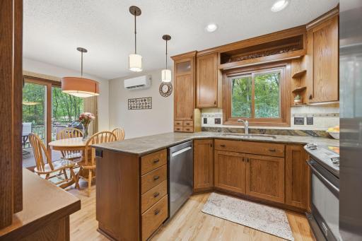 You can see how you can view the dining area and deck / outside right from the kitchen. Who's making dinner tonight? ;)