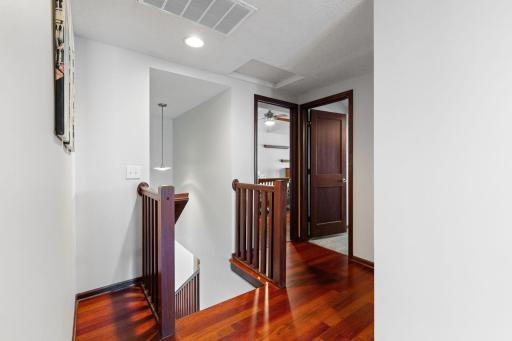 Upper level landing leads to 4 bedrooms and bath.