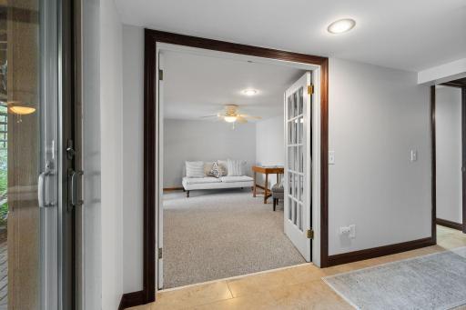French doors open into this flex space creating an inviting area for relaxing or entertaining.