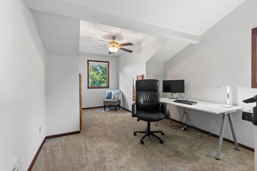 Offering a similiar layout, this bedroom is currently being used as an office.