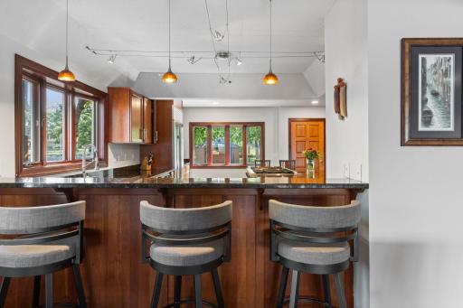 Breakfast bar creates a convenient connection between the kitchen and living room.