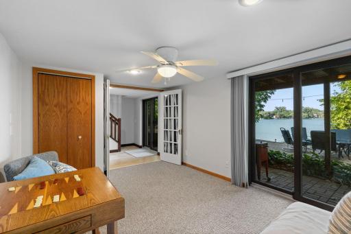 Lower level flex space offers versatile options such as a sitting area, den, fifth bedroom or workout space.