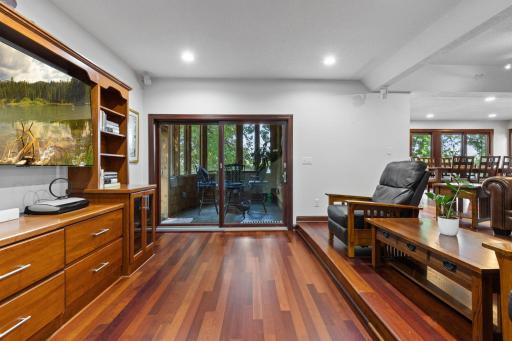 Patio doors lead to an enclosed porch.