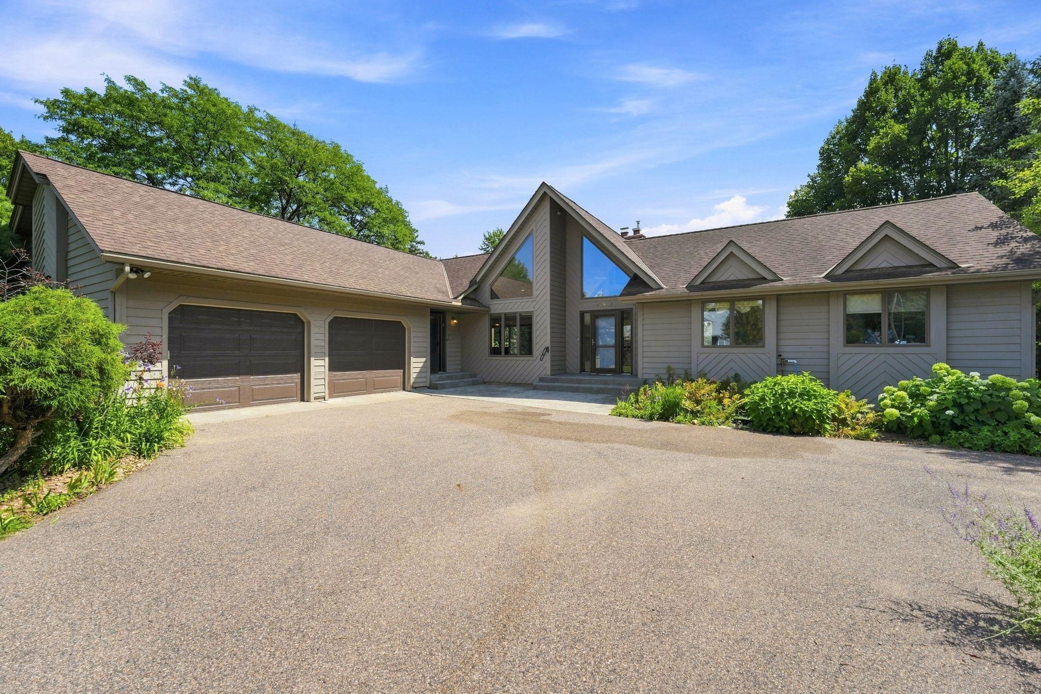 Eye catching curb appeal with arched roof