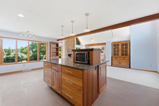 Oversized center island w/many drawers and cabinets