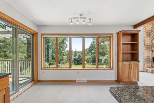 Extra large Informal Dining overlooking the beautiful backyard