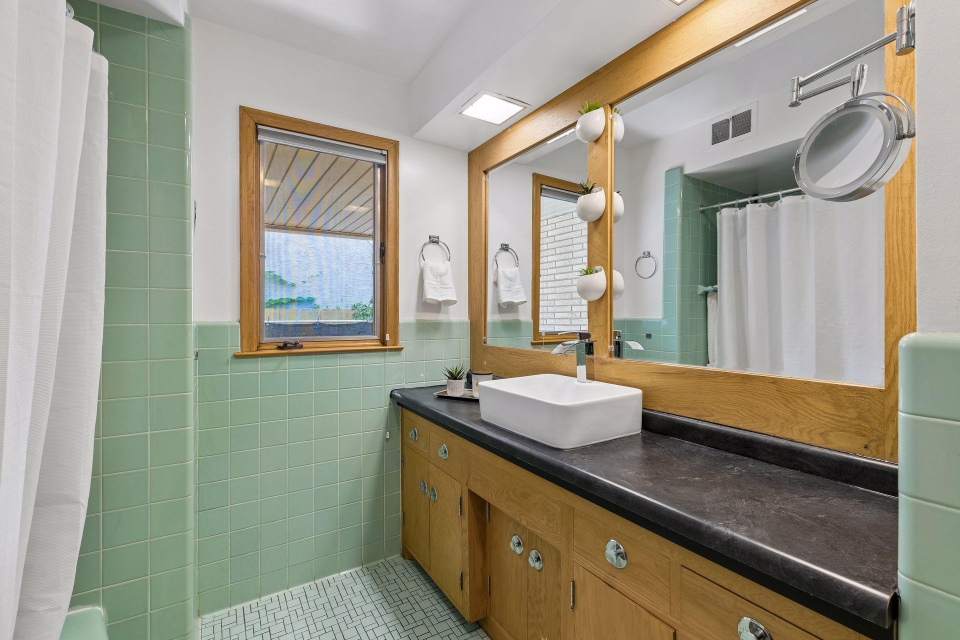 Main level full bathroom.
