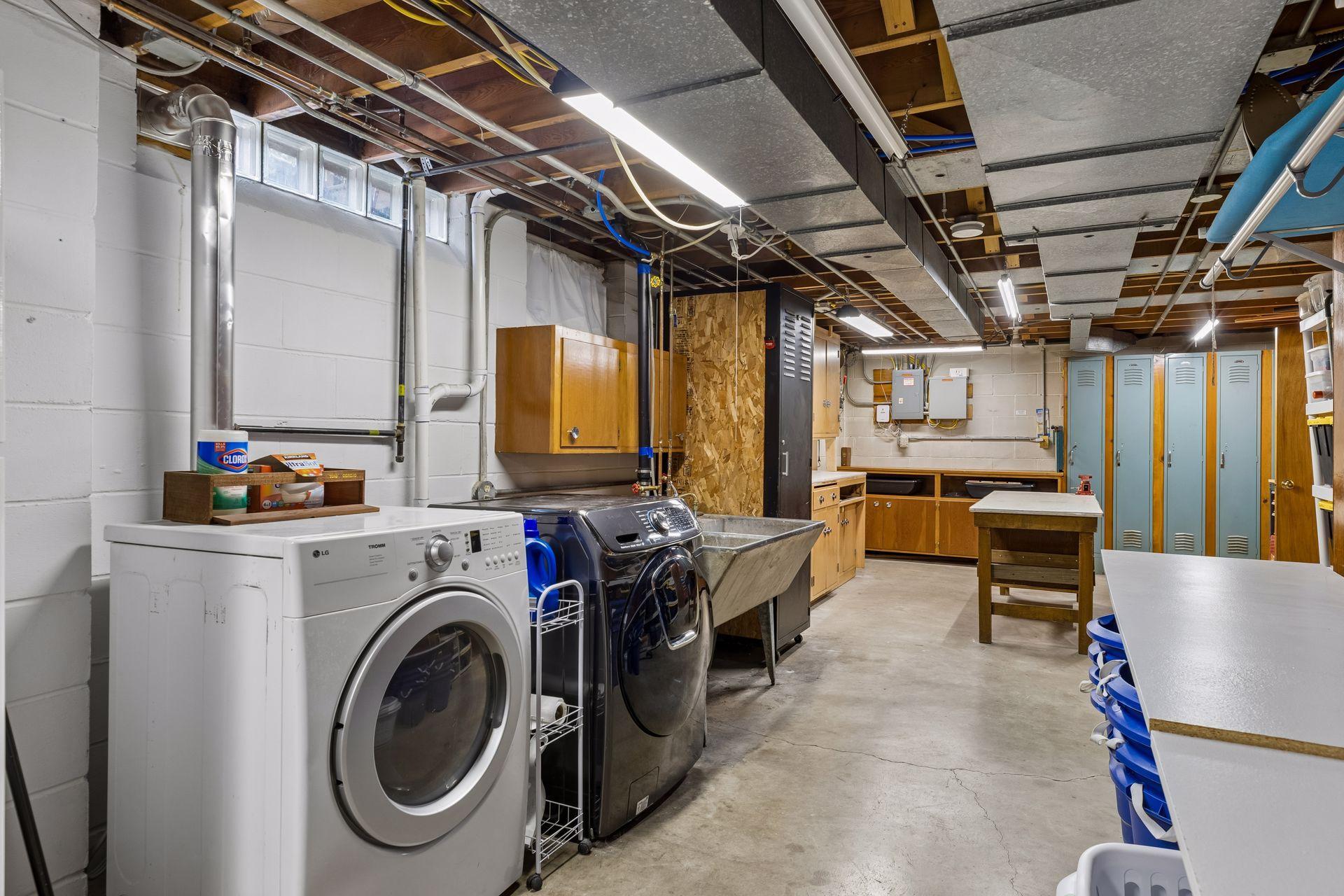 Large laundry/utility room with extra storage space.