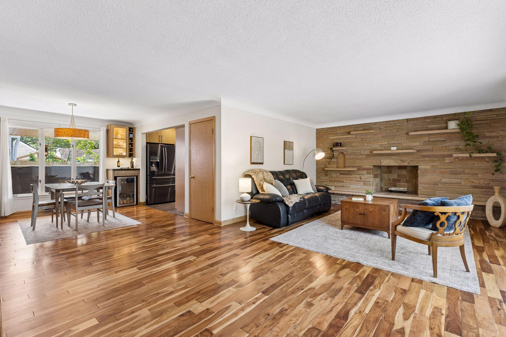 Step inside to an inviting open-concept main level featuring a spacious living room and dining area, perfect for everyday living and entertaining.