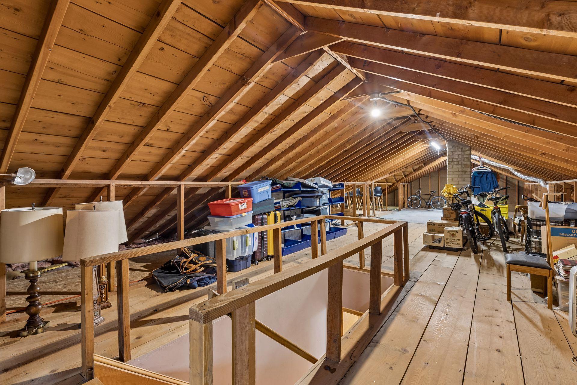 Large attic space offers incredible potential for additional storage or future finished living space—the possibilities are endless!