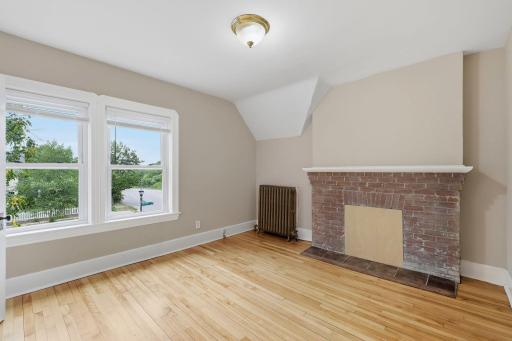 Upstairs first bedroom with fireplace. This could open back up, or put an electric fireplace