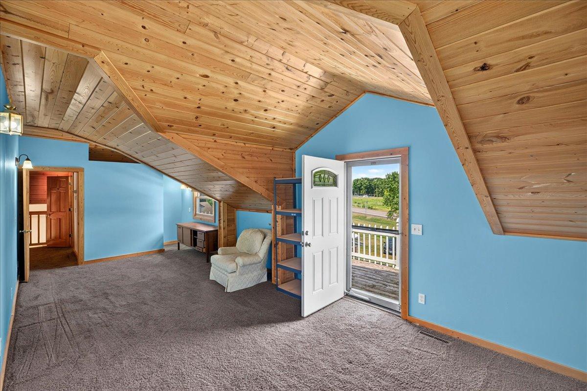 Upper Level Bedroom with deck access.
