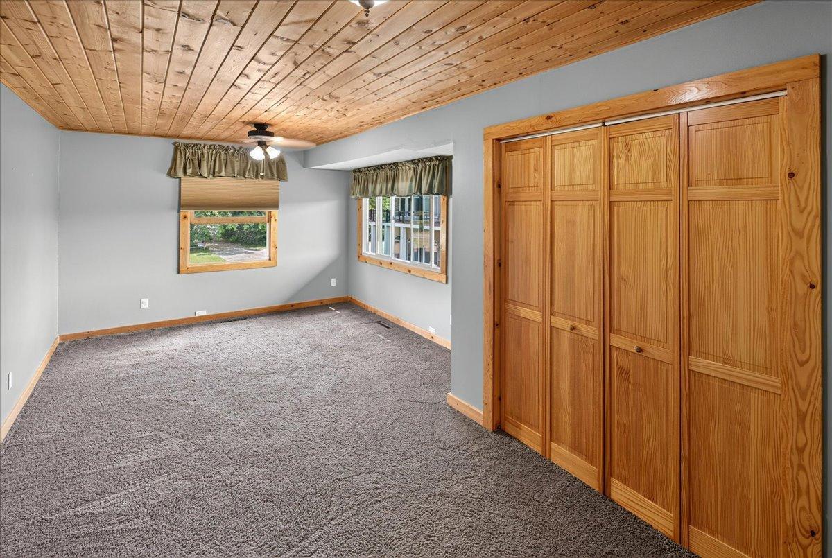 Bedroom with lot's of space & storage.