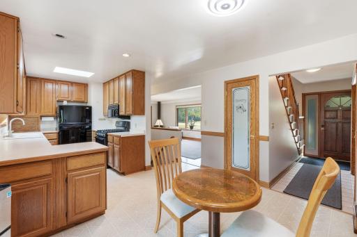 Eat in kitchen area with views into the living room.